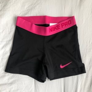 XS Nike pro shorts,  black with pink accents